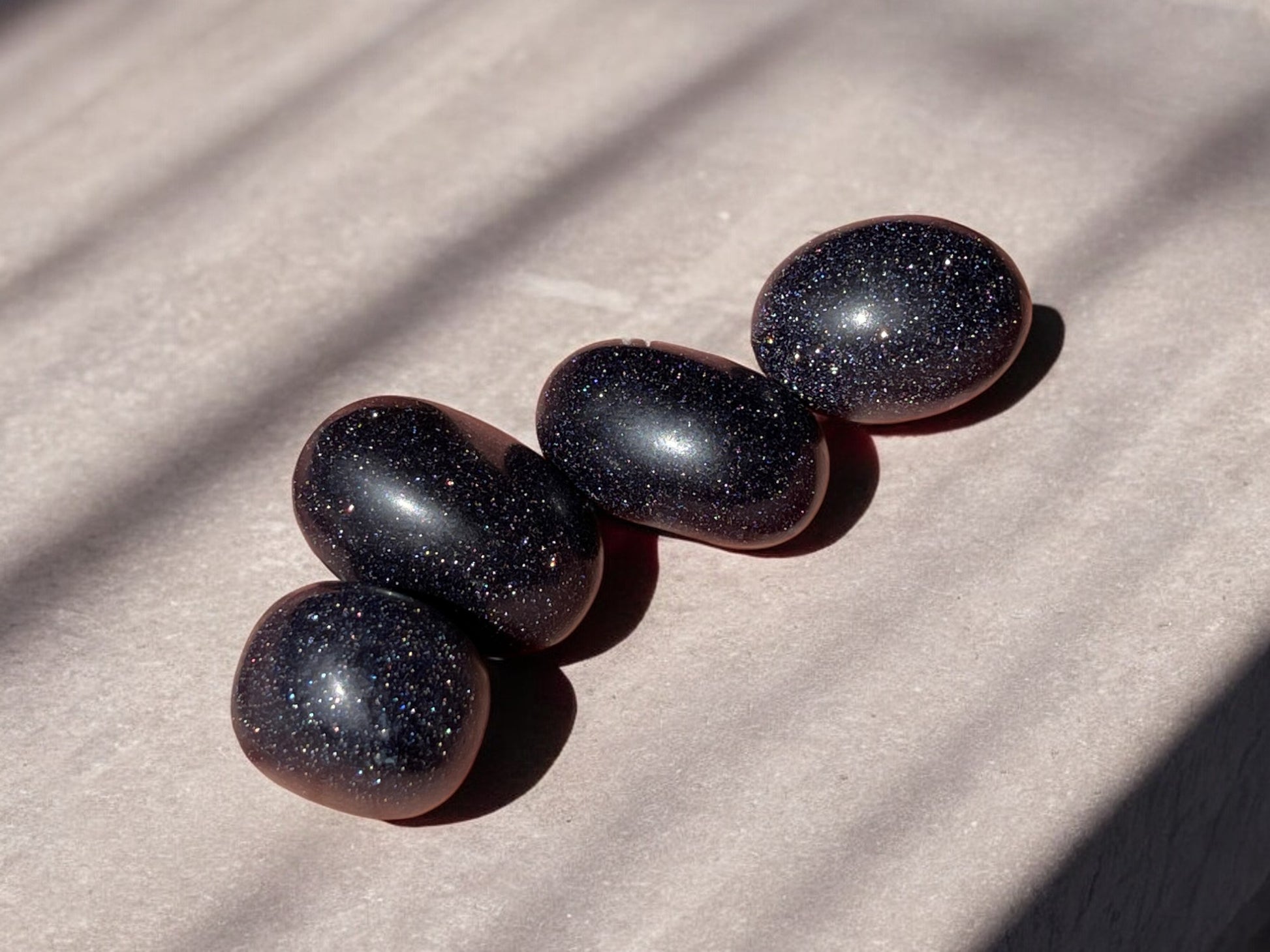 Blue goldstone tumbled stones