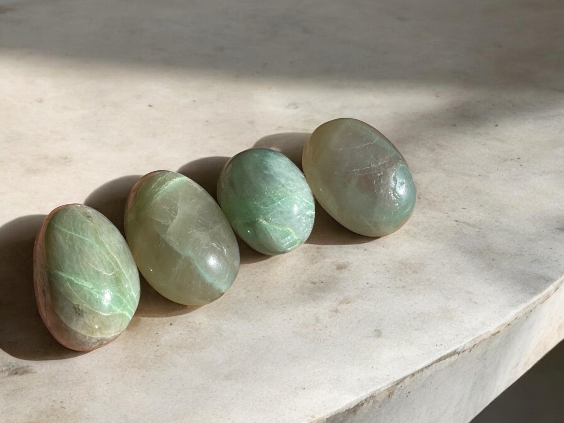 Green moonstone tumbled stones