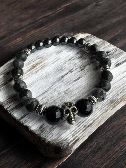 Black Onyx, Snowflake Obsidian, Larvikite, and Hematite Skull Crystal Bracelet