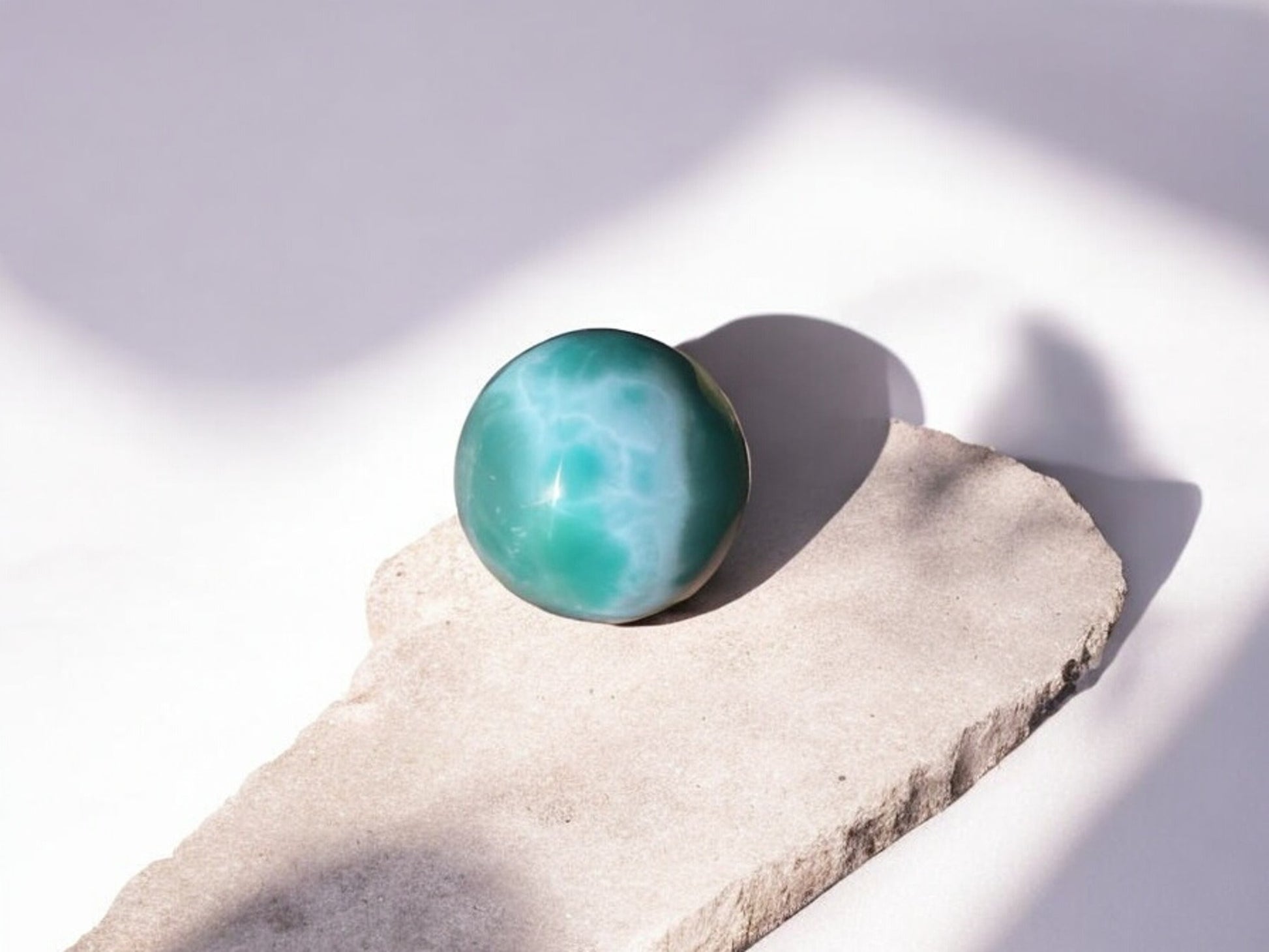 Larimar stone crystal sphere with waves