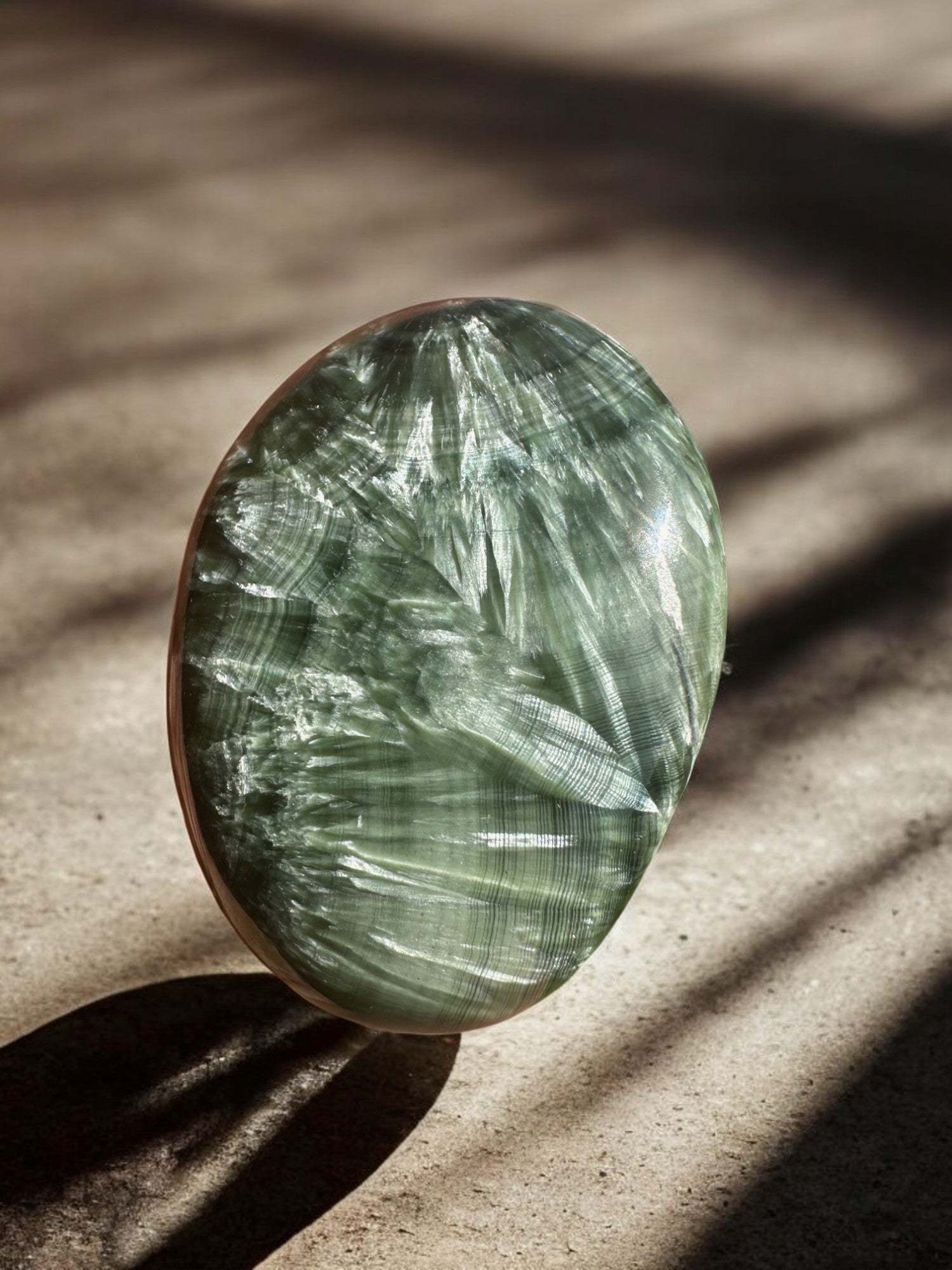 Rare Seraphinite palm stone