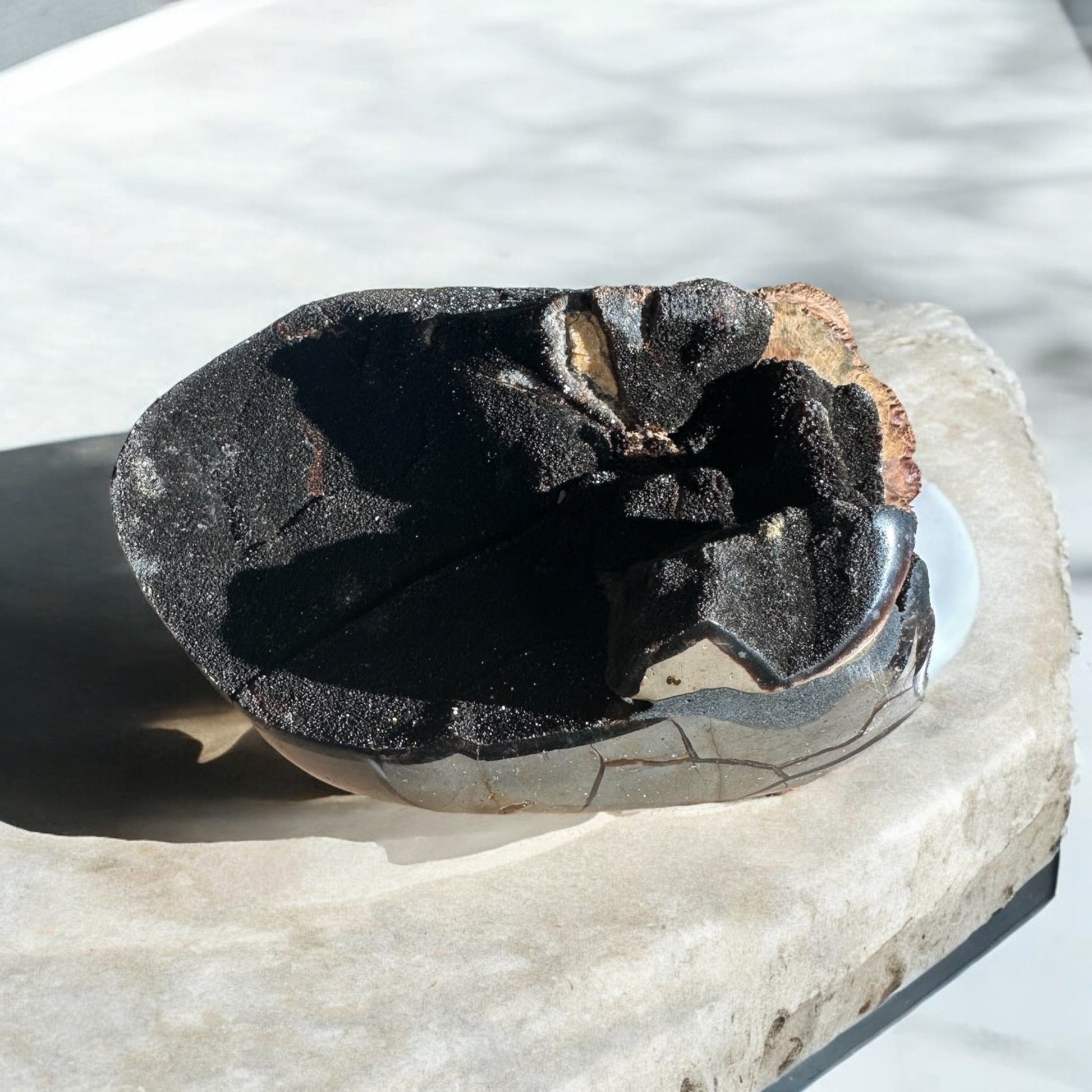 Septarian egg crystal shape on concrete