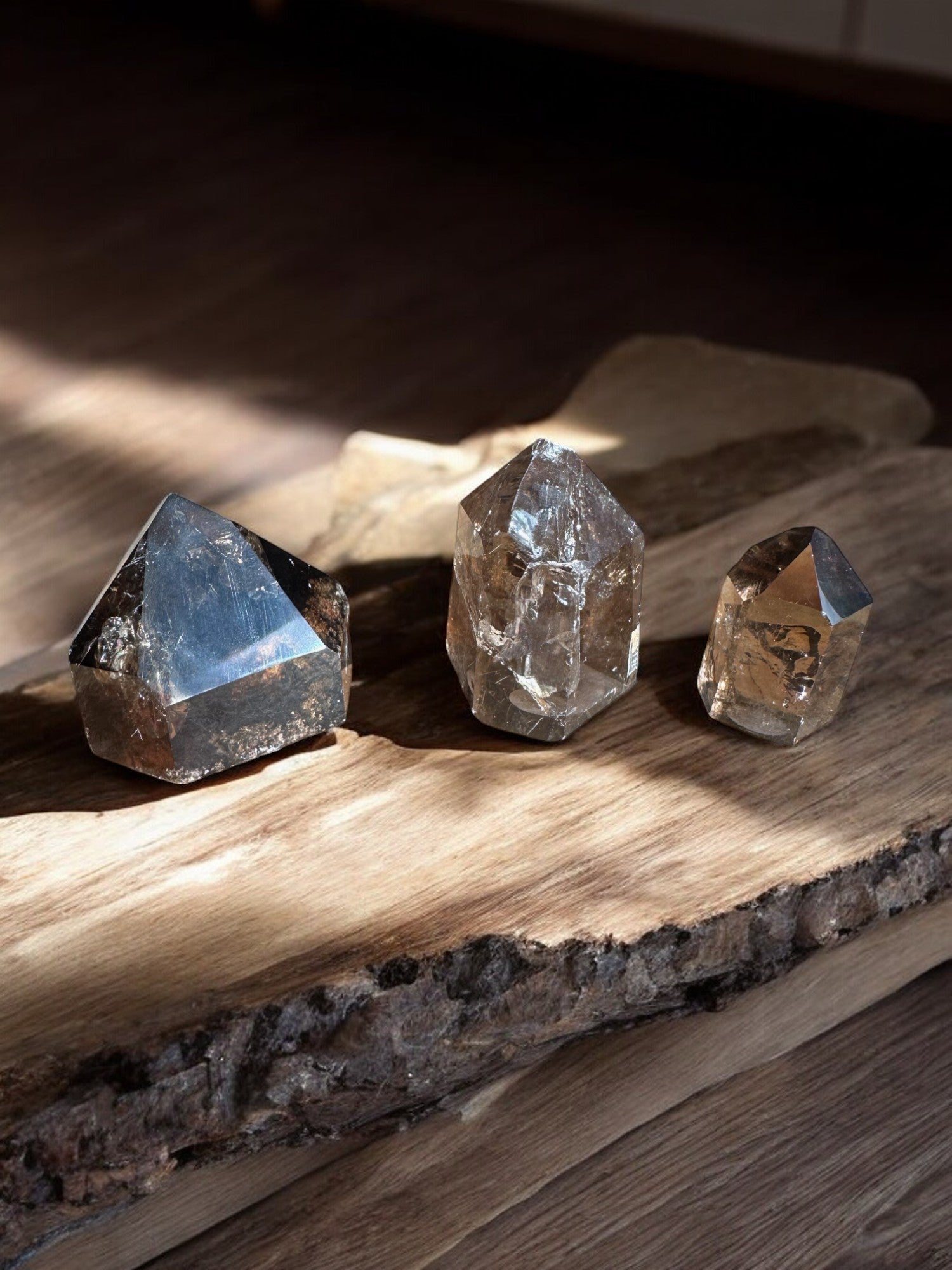 Smoky quartz crystal towers on a slab