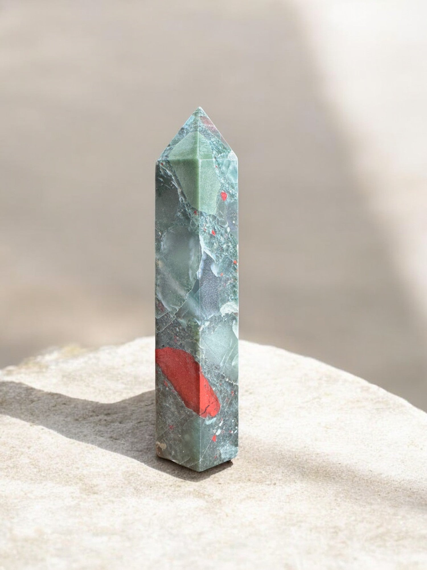 African bloodstone crystal tower with inclusions