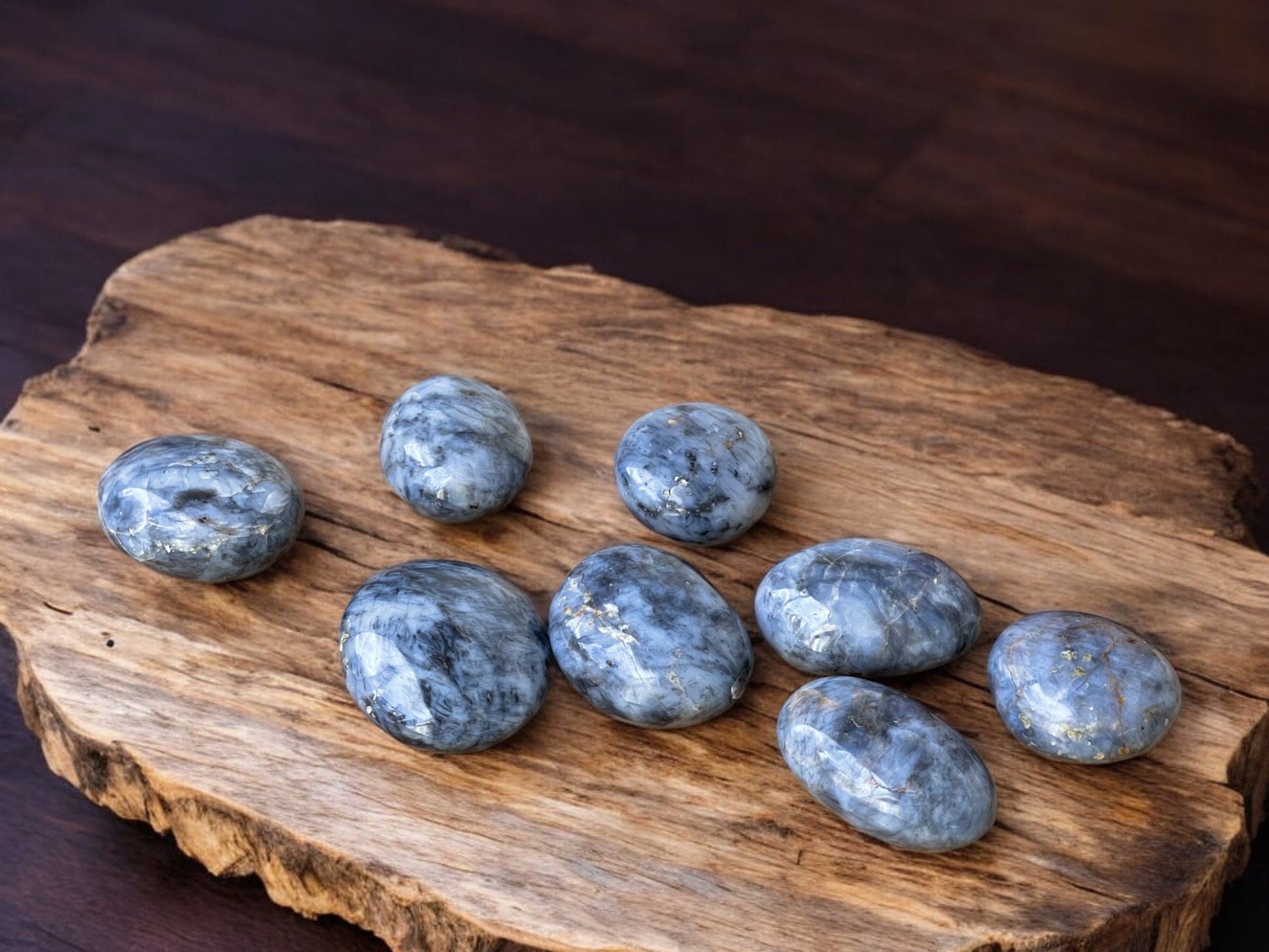 blue opal palm stones on a slab