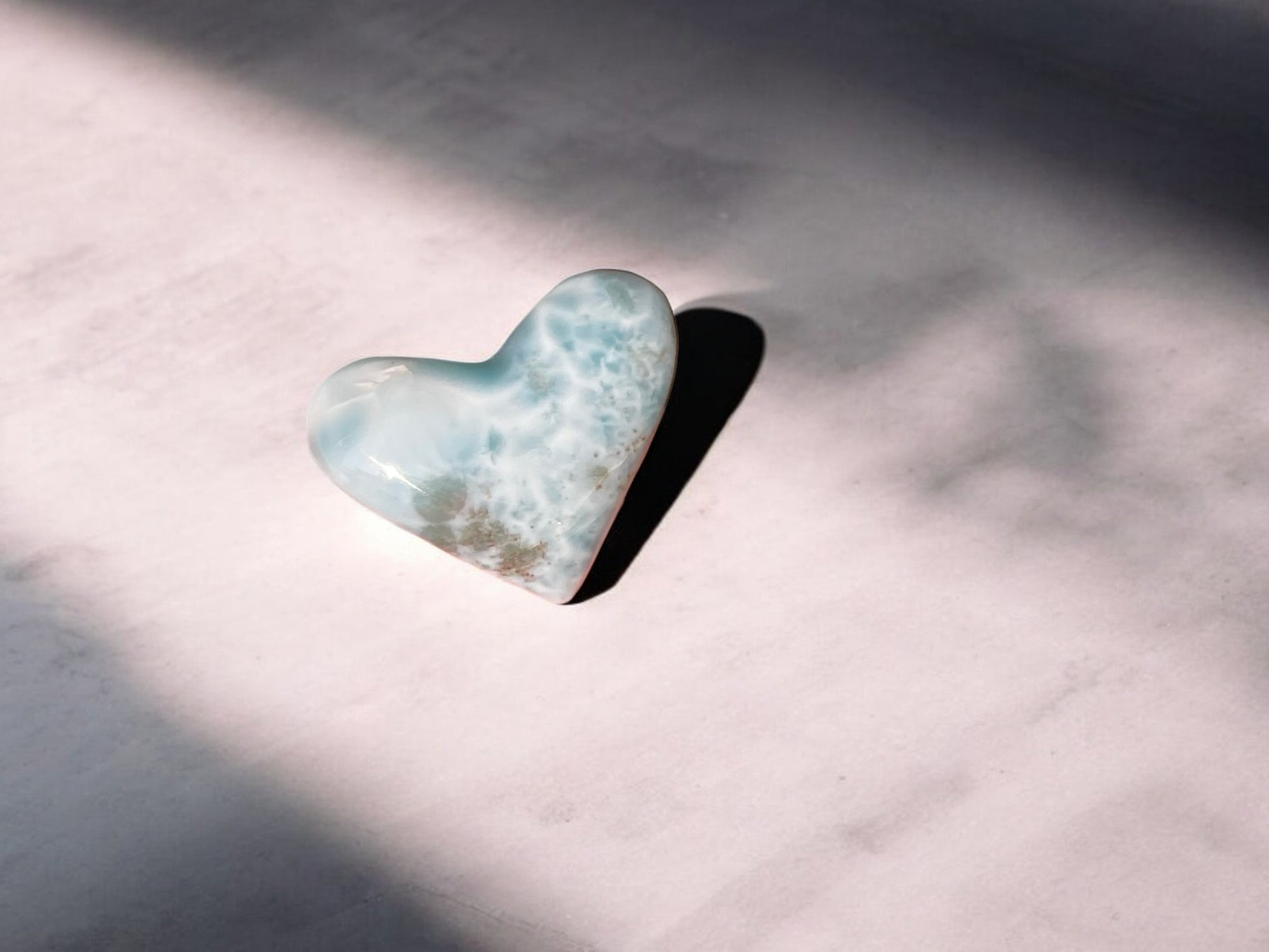 larimar crystal heart with inclusions