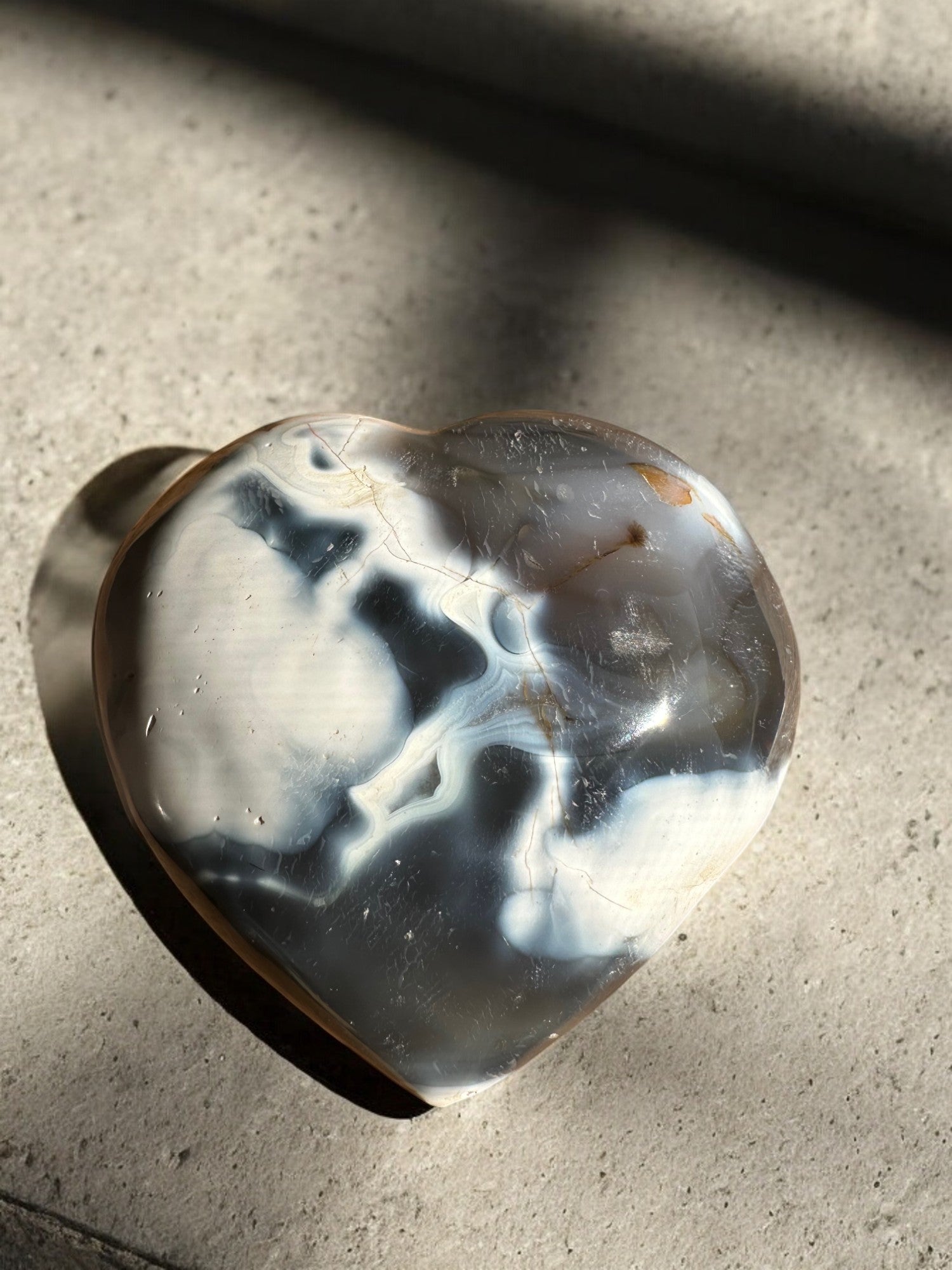 Orca agate crystal heart with white pattern