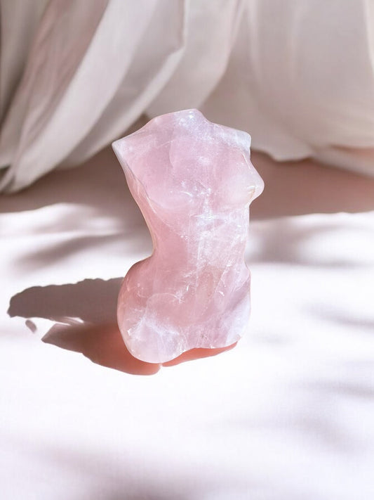 Rose quartz crystal figurine